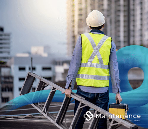 A person in a safety vest and hardhat carrying a ladder